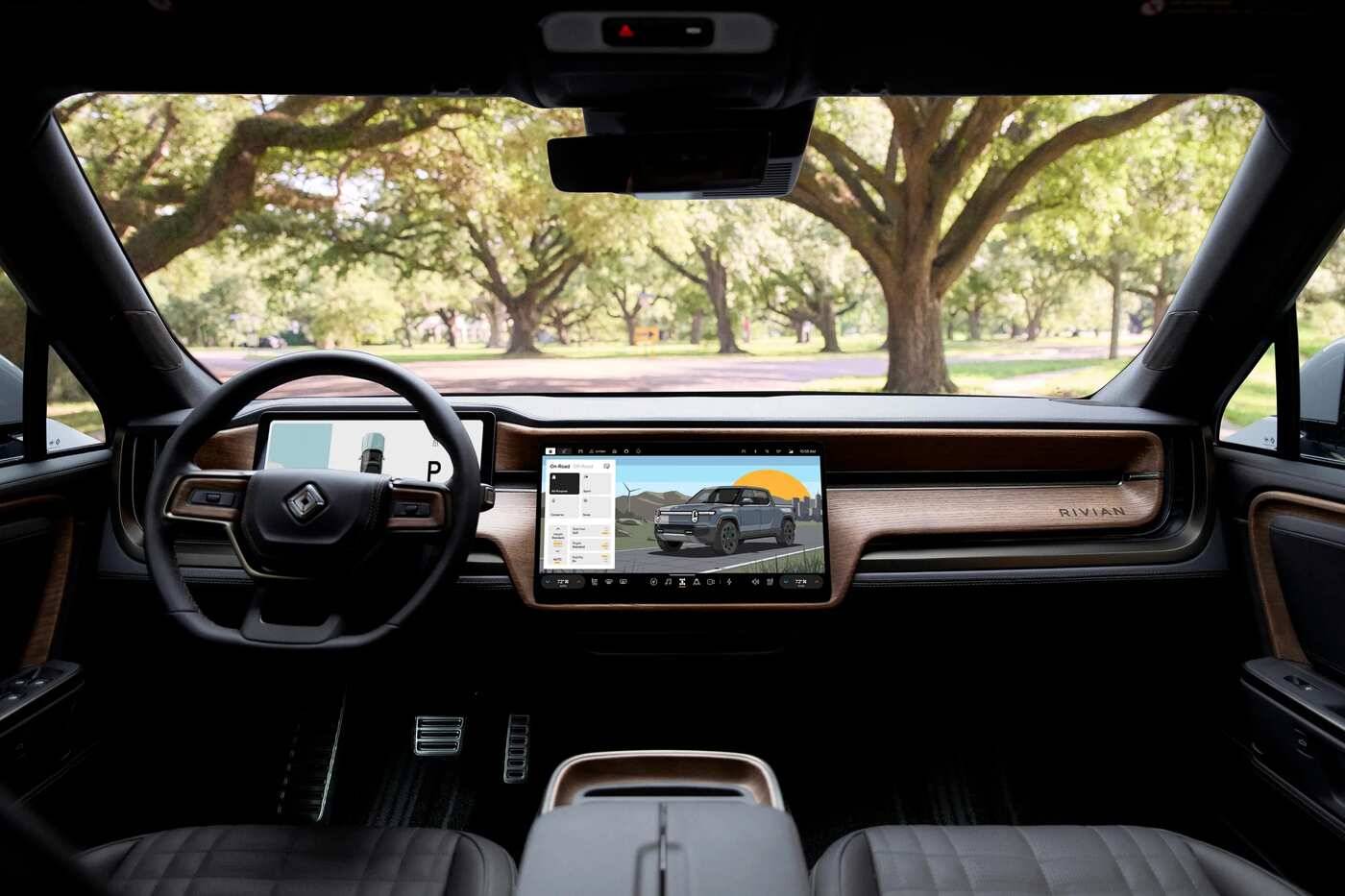 https://static.tcimg.net/vehicles/oem/1d1a31ae7e375699/2025-Rivian-R1T.jpg